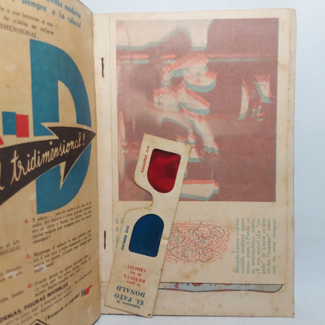 un par de anteojos 3d de los años 90 sobre una revista